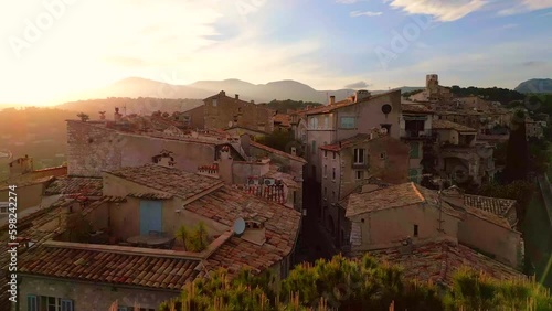 view from the top of the hill to village on sunset 