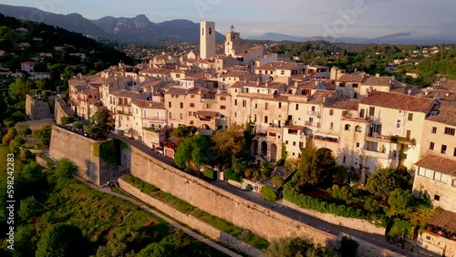 view from the top of the hill to village on sunset 