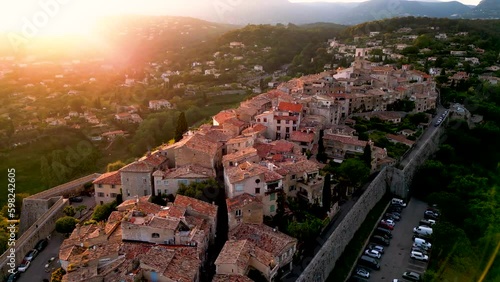 view from the top of the hill to village on sunset 