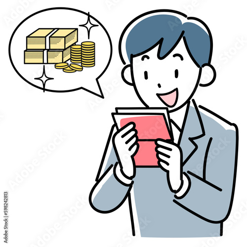 通帳を見て喜ぶビジネスマンの上半身