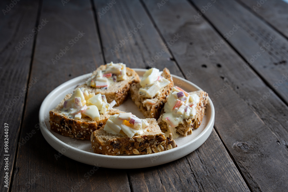 seven oats wheat bread topped with crab egg mayo seven oats wheat bread topped with crab egg mayo