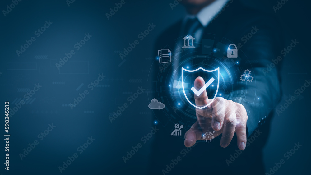 Businessman tapping showing data privacy protection or secure online transaction with shield icon On virtual screen, cyber security concept, internet secure technology Businessman tapping showing data privacy protection or secure online transaction with shield icon On virtual screen, cyber security concept, internet secure technology