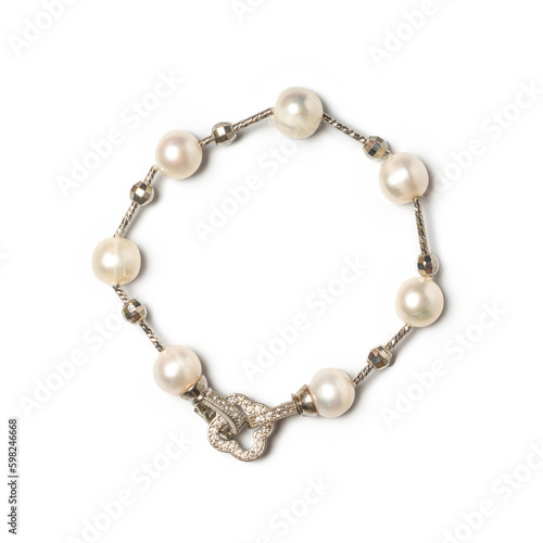 Freshwater pearl bracelet with platinum hook and diamonds on white background. Collection of luxury jewelry accessories. Studio shot