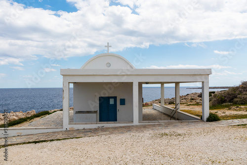  Greek Ayioi Anargiroi Church in Cyprus. A small Orthodox church on an island by the sea