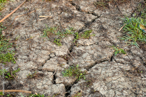 Obraz na płótnie Land with dry and soil drought cracked landscape, Global warming concept. w salonie