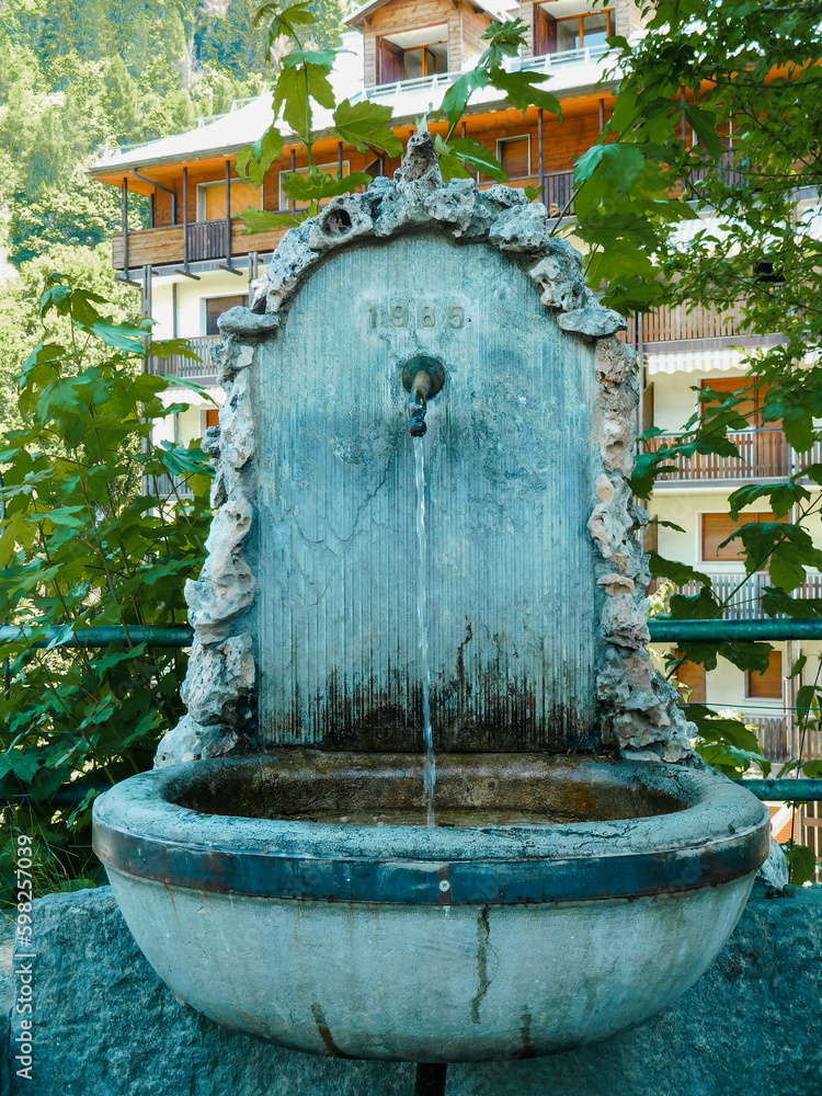 Village fountain in Alps