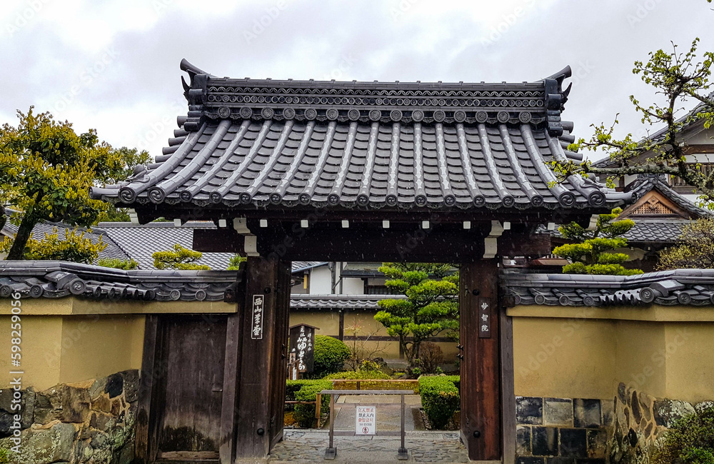 Kyoto, Japan in April 2019. One of the entrance gates of Chionin Temple in Kyoto with a Buddhist gate building Kyoto, Japan in April 2019. One of the entrance gates of Chionin Temple in Kyoto with a Buddhist gate building