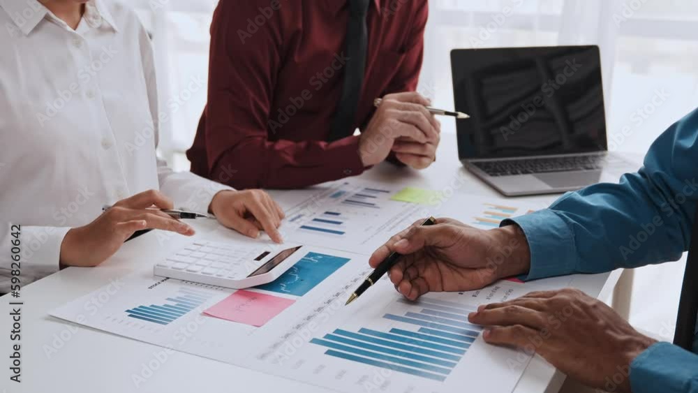 Young colleagues having great business conversations in a modern coworking office. Teamwork concept. Horizontal blurry background. Fireworks.. Young colleagues having great business conversations in a modern coworking office. Teamwork concept. Horizontal blurry background. Fireworks..
