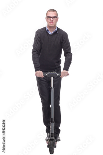 Full length portrait of a cheerful cool man with a scooter gesturing ok with his hand © ASDF