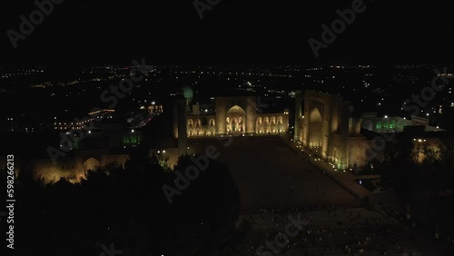 Samarkand, Uzbekistan aerial view of Ulug bek madrassah,  Colorfull Registan square at night