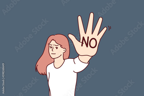 Brave woman makes stop gesture showing palm with inscription no to call for end to violence or discrimination. Woman feminist expresses denial and fights against discrimination or Generative AI