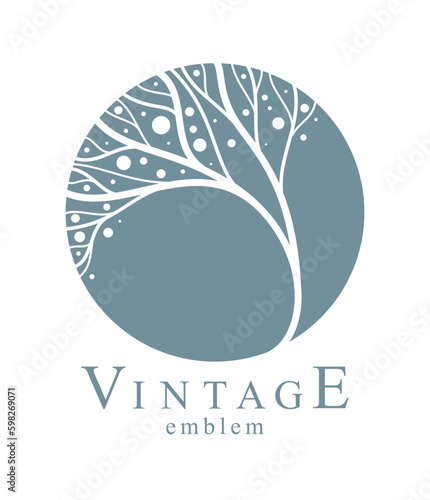 Round floral vintage linear logo design template for boutique or hotel or salon logo isolated on white, beautiful line drawing of leaves composition in a circle, branches growth nature.