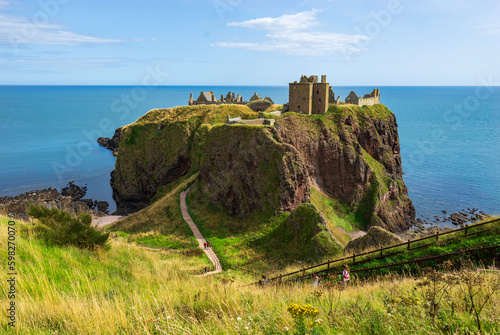 Dunnnottar Castle in the rocky headland above the sea. Medieval fortress in Scotland coast. Great Britain, United Kingdom.
