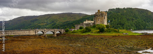 Eilean Donan Castle in Scotland in the evening. Tidal island between Loch Duich, Loch Long and Loch Alsh. Western Highlands, Scotland, Great Britain, United Kingdom. photo