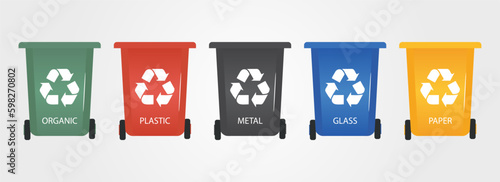 Trash reusing container collection in a flat design. Organic, plastic, metal, glass, paper garbage bin