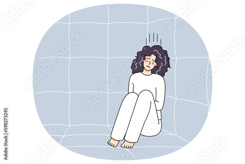 Unhappy sick woman in straitjacket sit on floor in psychiatric clinic suffer from mental disorder. Upset ill female patient or madhouse struggle with psychiatric issues. Vector Generative AI