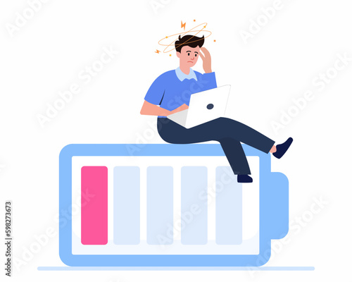 Exhausted young businessman with low battery because of overwork, Deadline, Tiredness concept.