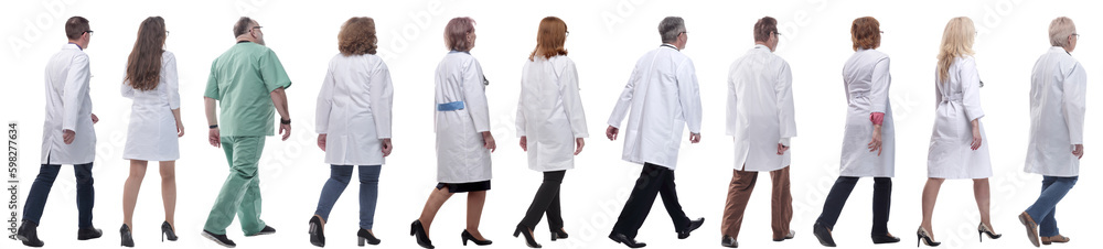 group of doctors in motion isolated on white group of doctors in motion isolated on white
