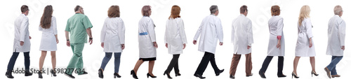 group of doctors in motion isolated on white