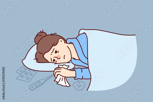 Woman sick with flu lies under blanket with handkerchief in hand near thermometer and medicines to treat fever. Sick girl needs qualified medical care due to outbreak of viral infection Generative AI