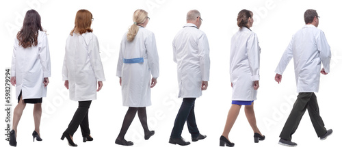 group of doctors in motion isolated on white
