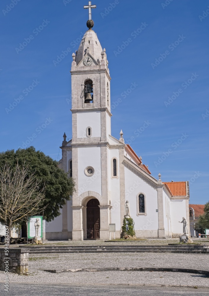 Fatima, Portugal - March 26, 2023: The Parish Church of Fatima also known as Parish Church of Fatima and of the Little Shepherds or Mother Church of Fatima. Sunny spring day. Selective focus