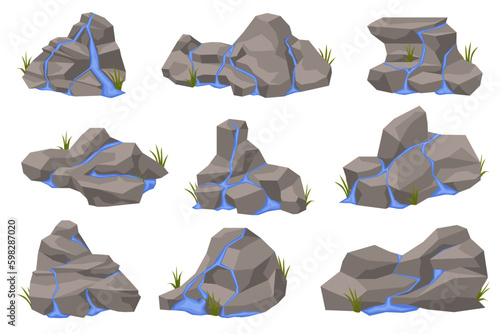 Water spreading over the surface of the stones. Waterfall on different rocky surfaces. Water streams on cracked stone or rocks surface.