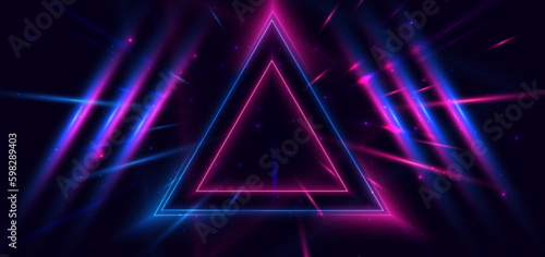 Abstract technology futuristic neon triangle glowing blue and pink light lines with speed motion blur effect on dark blue background.