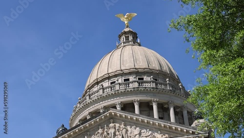 Closeup of Mississippi State Capitol building in Jackson, Mississippi with video tilting up to dome. photo