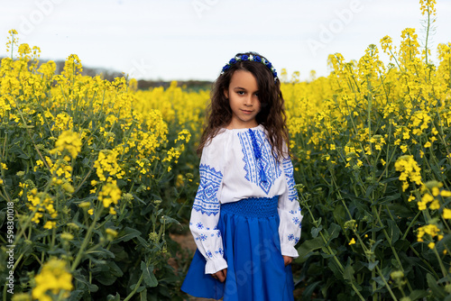 Pray for Ukraine. Stop war. Ukraines Independence  Day. Constitution day. Ukrainian girl  in embroidered shirt vyshyvanka. Ukrainians are against war. Kolza photo