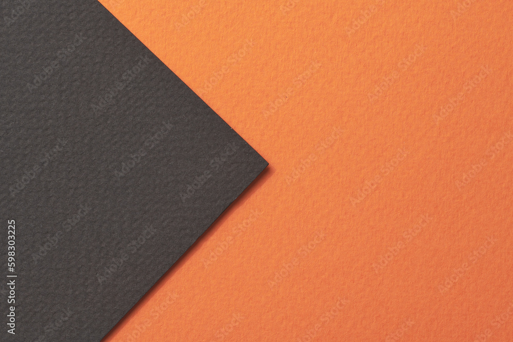 Rough kraft paper background, paper texture black orange colors. Mockup with copy space for text Rough kraft paper background, paper texture black orange colors. Mockup with copy space for text