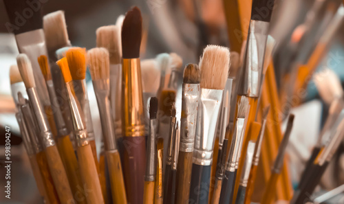 Brushes, art materials for painting, creative artworks closeup.