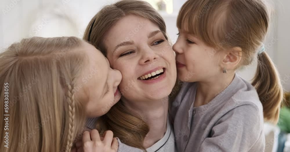 Slow motion shot of caucasian beautiful woman laughing cheerfully while cute daughters embracing and kissing her on cheeks at home Generative AI Slow motion shot of caucasian beautiful woman laughing cheerfully while cute daughters embracing and kissing her on cheeks at home Generative AI