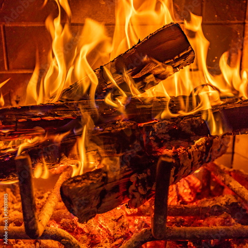 Close-up of fireplace burning wood photo