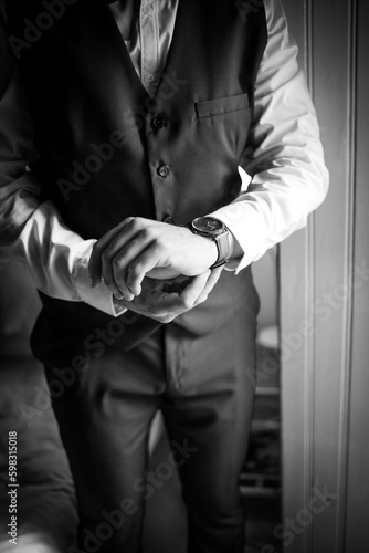 Close up creative image of a Groom's Wedding Attire at a real wedding © Dewald