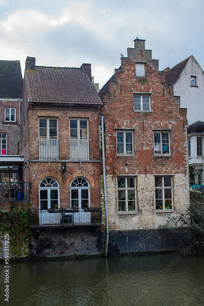 old stone houses on the canal in Belgium 