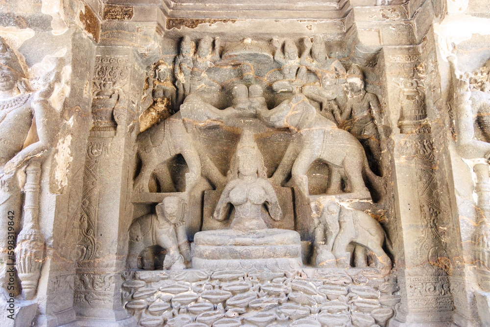 Sculpture with Hindu. Godess and elephants - the Kailasa temple, Ellora caves, Maharashtra, India, Asia