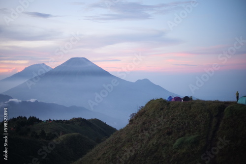 Morning view on the peak of prau mountain that located on the dieng plateau photo
