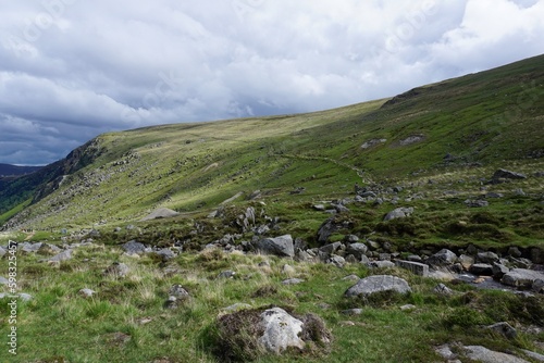 Hking trail in the cloudy landscape of Ireland