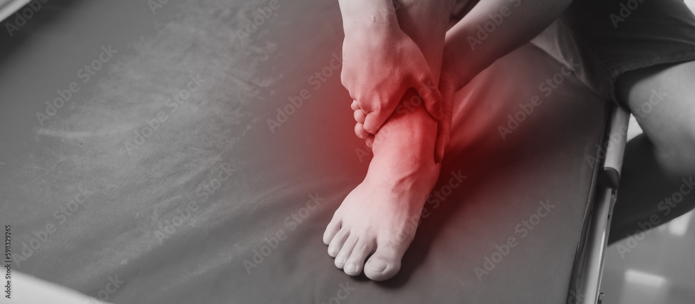 Obraz premium Close up man suffering from ankle pain.