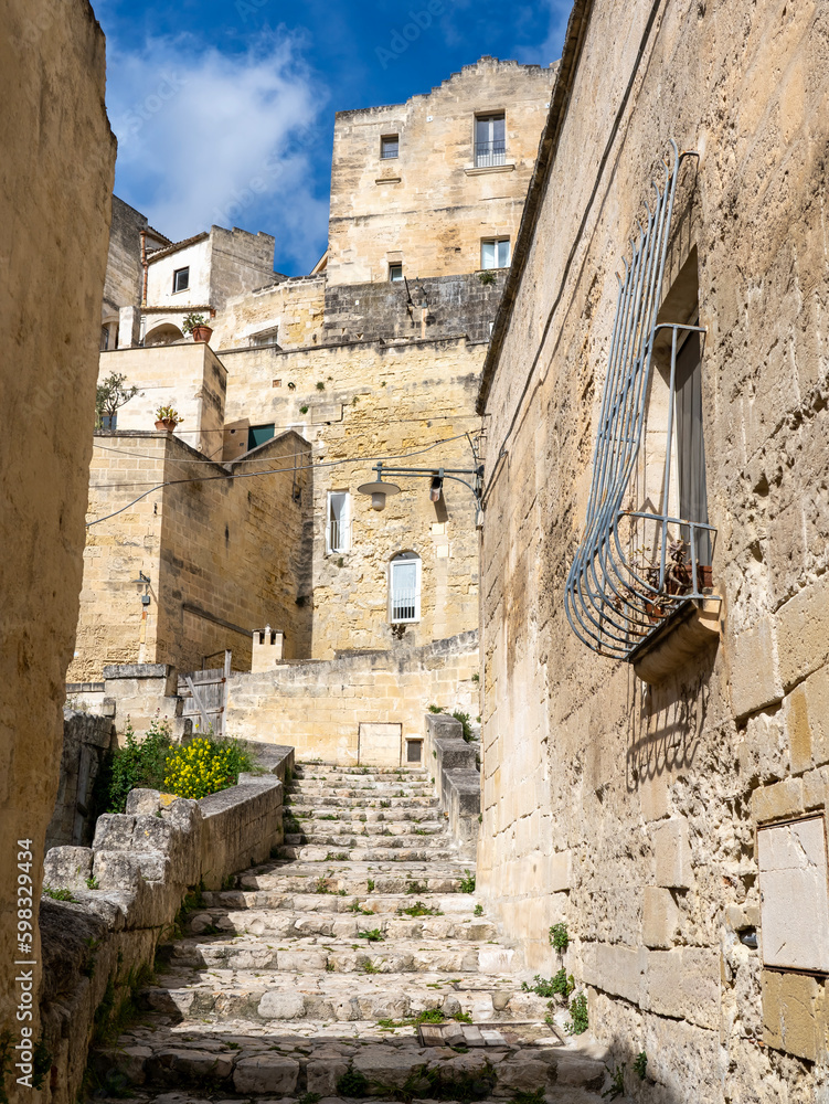Matera, Italy. View of the pedestrian area of the city of Matera. Landscape of the historical part of the town, Sassi di Matera. An Unesco World Heritage Site. Touristic destination