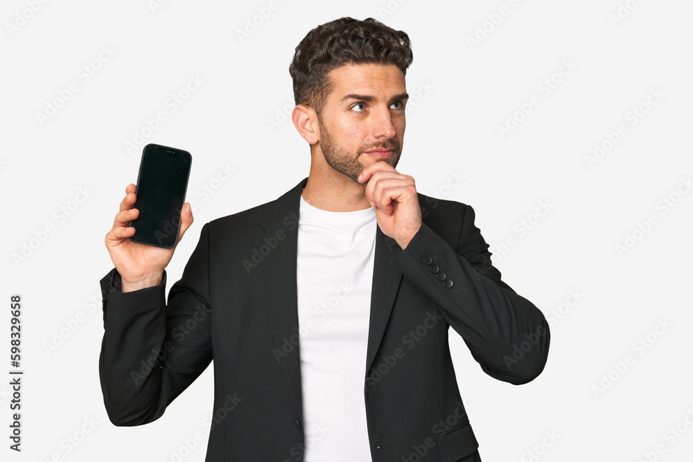 Young business caucasian man looking sideways with doubtful and skeptical expression. Young business caucasian man looking sideways with doubtful and skeptical expression.