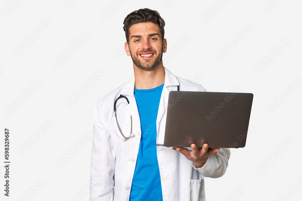 Young doctor man holding a laptop happy, smiling and cheerful. Young doctor man holding a laptop happy, smiling and cheerful.