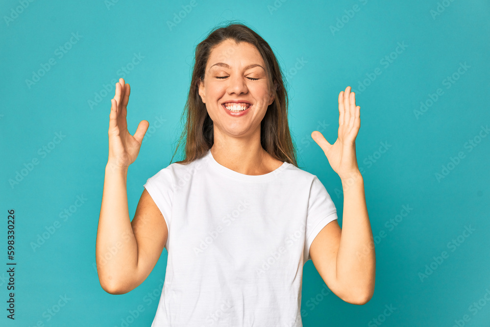 Fototapeta premium A young caucasian woman isolated joyful laughing a lot. Happiness concept.