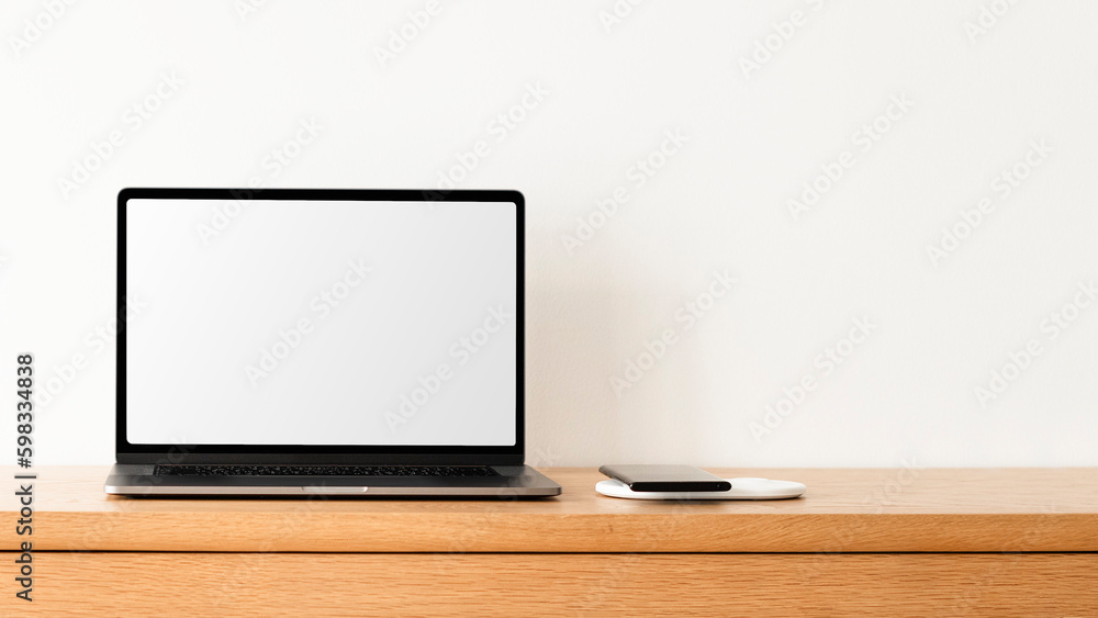 Laptop png screen mockup on a wooden table Laptop png screen mockup on a wooden table