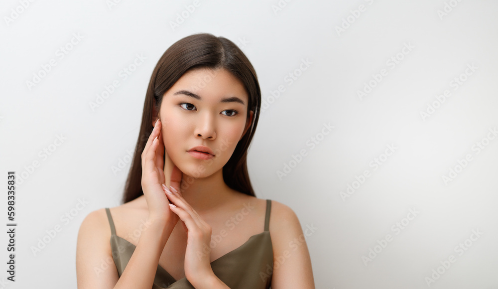 asian girl on grey background asian girl on grey background