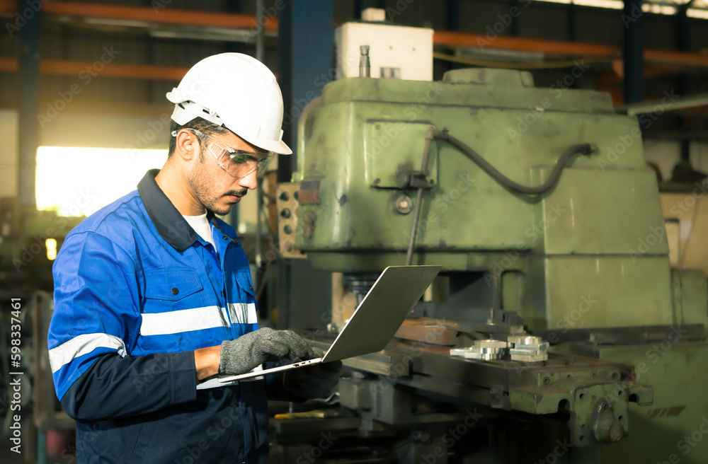 Portrait of worker, technician, professional engineer, helmet, using laptop, with control in production line. Portrait of worker, technician, professional engineer, helmet, using laptop, with control in production line.