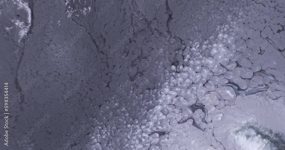 Slow motion gray paint abstract background. Dark gray white ink move flow, slowly spread closeup. 4k monochrome liquid footage. Pattern of acrylic fluid art texture. Calm current of Generative AI Slow motion gray paint abstract background. Dark gray white ink move flow, slowly spread closeup. 4k monochrome liquid footage. Pattern of acrylic fluid art texture. Calm current of Generative AI