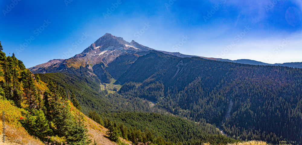 Fototapeta premium Mt. Hood, Oregon, USA - Ocotber 19, 2022: Vistas of Mt Hood and surrounding forests.