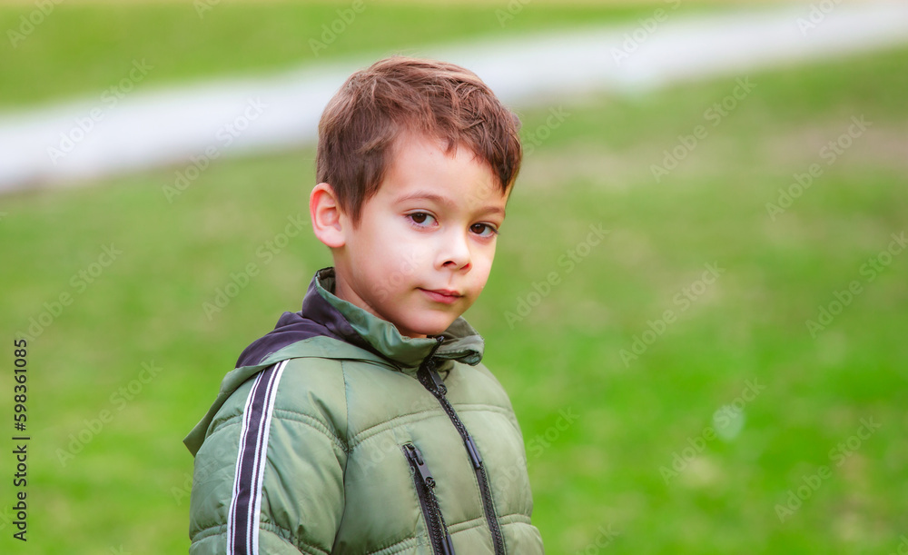 portrait of hispanic boy in the park portrait of hispanic boy in the park